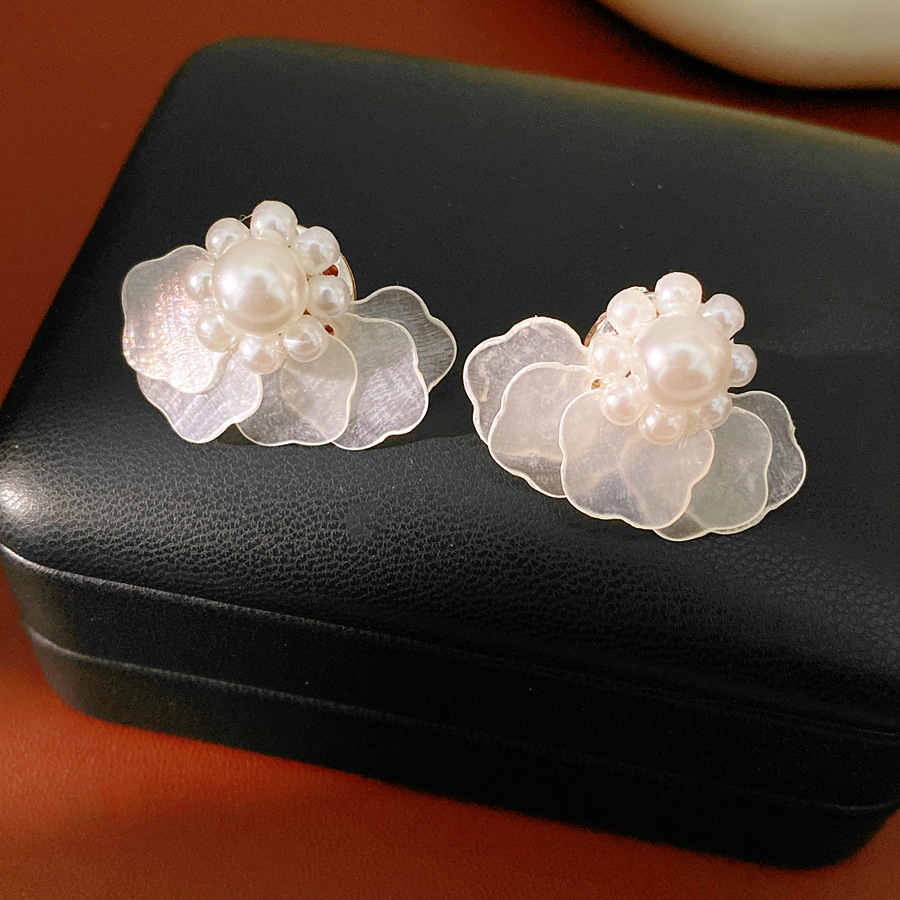 Layered Star-shaped Shell Stud - مراجعة Cluster Stud Ear وسعره