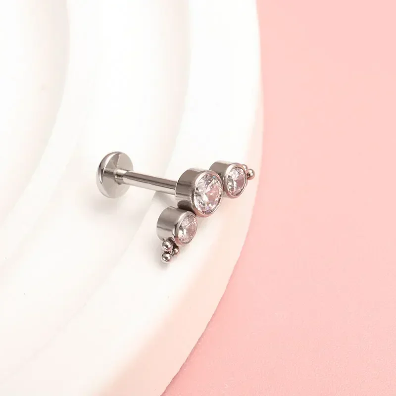 ASTM F136 Titanium Piercing 16 - مراجعة Cluster Stud Ear وسعره