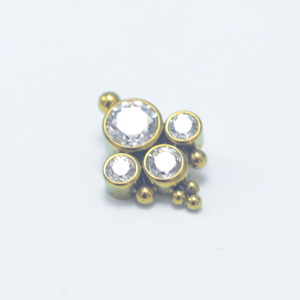 ASTM F136 Titanium Drill More  - مراجعة Cluster Stud Ear وسعره