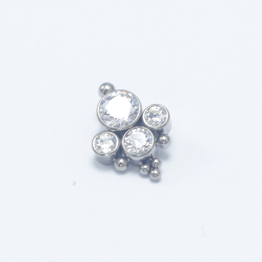 ASTM F136 Titanium Drill More  - مراجعة Cluster Stud Ear وسعره